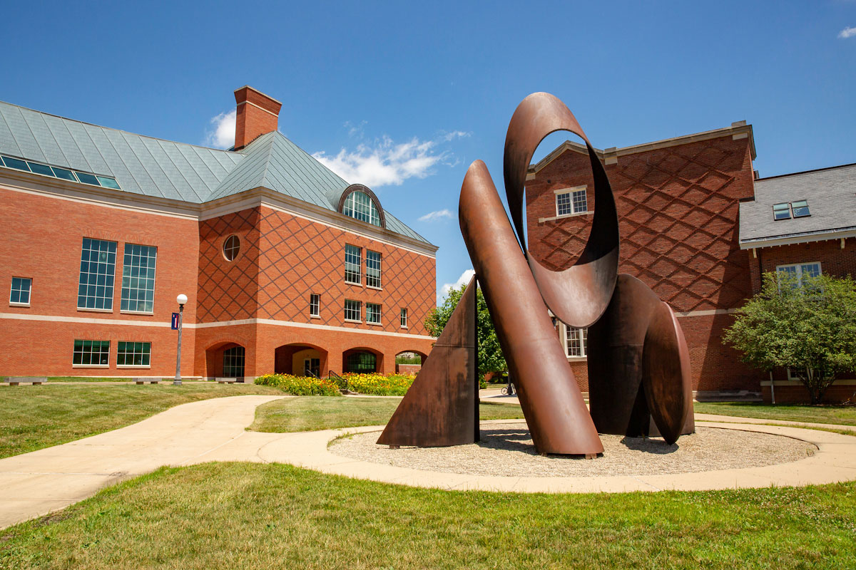 Grainger Engineering Library with Mananaan sculpture on Bardeen Quadrangle.